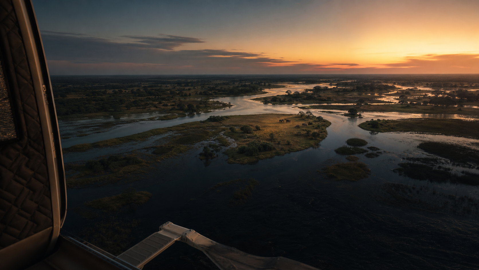 The Okavango Delta at sunset from a private aircraft